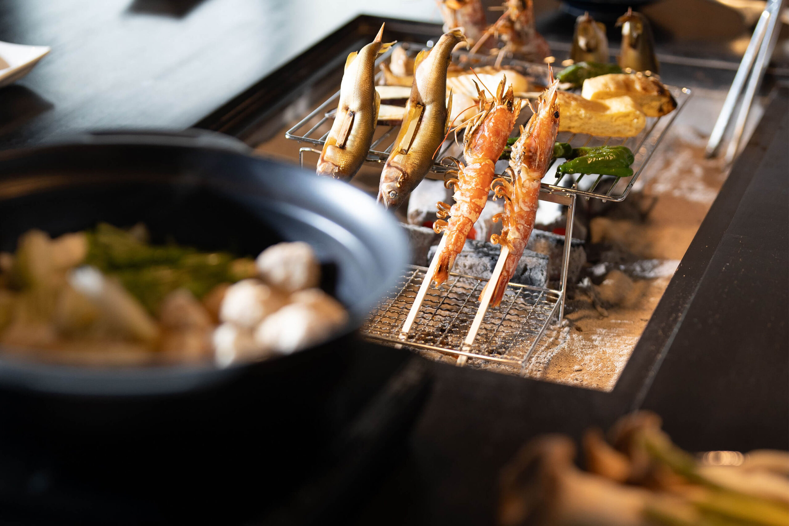 Authentic Irori (open hearth) cooking using local ingredients.